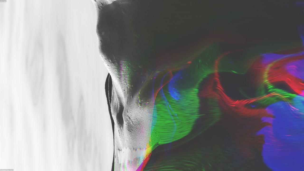 Abstract digital portrait with overlaid pixel artifacts.