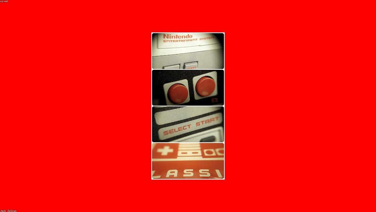 Gaming controller resting on a wooden table beside a glowing screen.